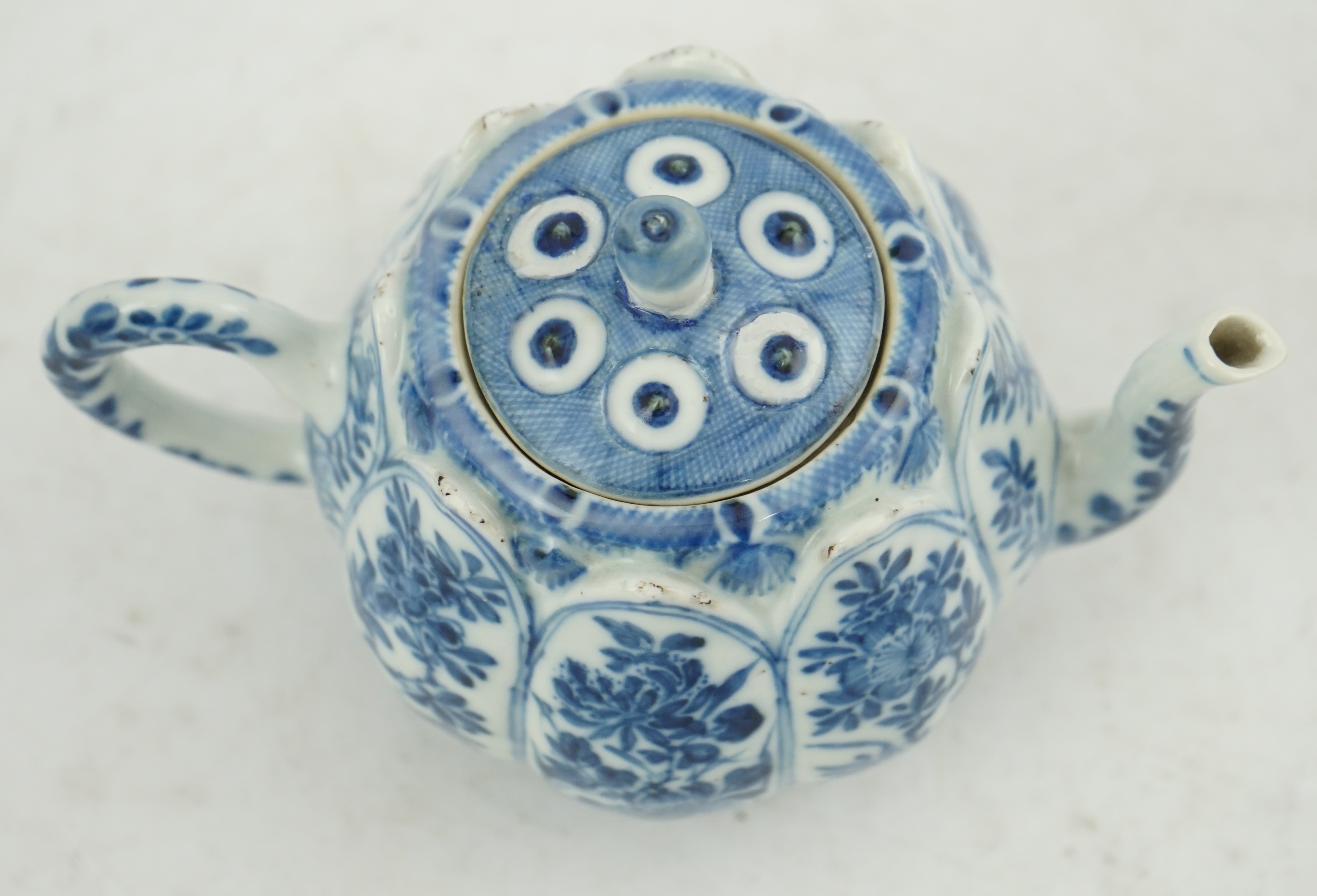 A Chinese blue and white lotus pod-shaped teapot and cover, Kangxi period